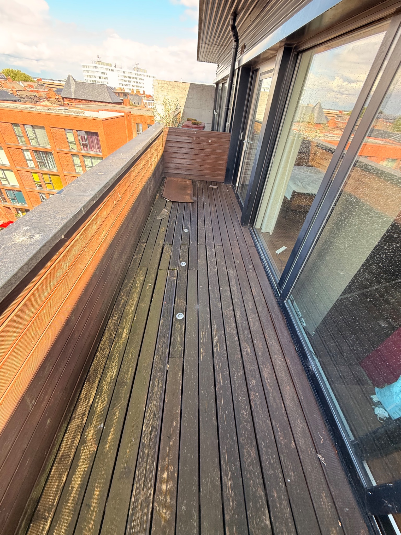 Original balcony decking before removal