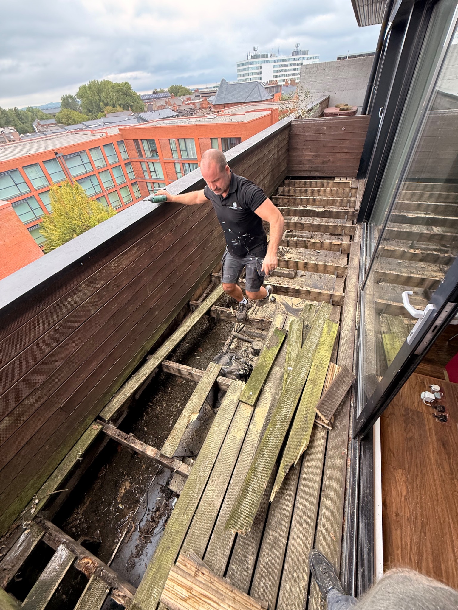 Old balcony decking being removed